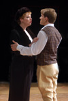 Emily Brown as Miranda Frayle discusses the future with Patrick Myers as Nigel in <i>Relative Values</i>. - Photo by Jim Veneman