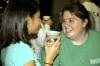 11/27/06 - McAfee resident assistants Sophomore Kristmar Rawlins, learning foundations major, and Senior Amanda Blankenship, biology major, have a good time conversing and enjoying free hot chocolate during Christmas decorating in McAfee commons. 