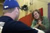 Stephen Powell sits down to talk to Amy Brown while at the Frost Fest carnival put on by SAC. - Photo by Stephanie Schroeder