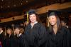 12/16/06 - Danielle Pope, mathematics graduate, and Eunice Sung, biology/chemistry graduate, take their places at the beginning of the fall graduation ceremony. - Morris Abernathy