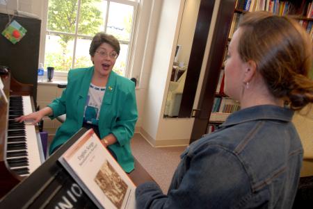 Georgia Wellborn, professor of music, works with Kathryn LaMar during a voice lesson.