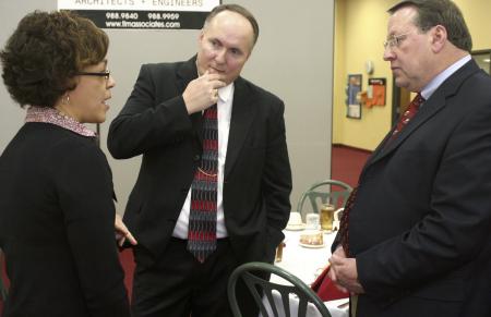 Aubry Harris speaks with Jerry Tidwell and Larry Vaughan at the ninth annual Union Forum.
