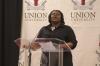 Shawanda Richardson gave a welcome to the attendees of the First Annual Black History Month Program. - Photo by Wayne Holmes