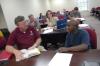 Members of the MCS program fellowship before class. - Photo by Morris Abernathy