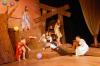 The sprites surround Kip Arrowood and Julie Palmer during the theatre's production of <em>The Tempest</em>.  The sprites are Kinsey Bolinger, Sara Chinery, Catherine Schulz and Melissa Miller. - Photo by Morris Abernathy