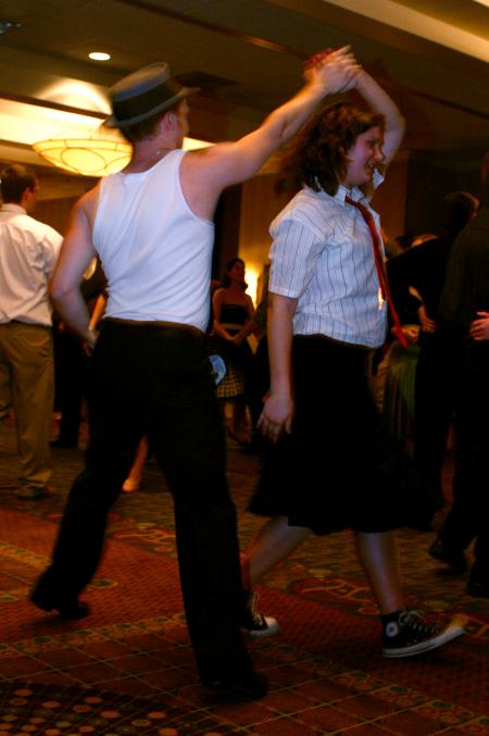 Jay Gunn spins Junior Rachel Hoyt during SAC's Swing Dance at the Andrew Jackson Ballroom of the Double Tree Hotel.