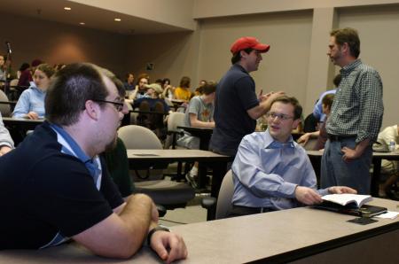Junior Josh Armacost talks with Dr. Gregory Thornbury, dean of School of Christian Studies, while Senior Bryan Spillman talks with Dr. David Gushee, Graves professor of moral philosophy, before a forum on the issue of homosexuality.