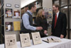 Union graduates Josh Trent and Autumn Alcott Ridenour join their former professor David Gushee at a ceremony in the Emma Watters Summar Library where they presented copies of their book on the Holocaust to the library.  The book is entitled, <i>When Night Fell: A Student Response to the Holocaust</i>. - Photo by Jim Veneman