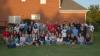Members of the Class of 2007 posed for a group photograph at the home of President Dockery. The spring gathering for fun and fellowship has become an annual tradition and marks the beginning of graduation festivities for about 400 spring graduates. - Photo by Morris Abernathy