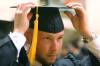 5/19/07 - Physical Education and Health graduate Clint Arthur adjusts his cap moments before heading out to the Great Lawn for the spring 2007 graduation ceremony. - Kyle Kurlick