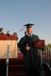 Business Administration graduate Jack Smothers celebrates after receiving his diploma at the spring 2007 graduation ceremony. - Photo by Morris Abernathy