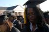 Jande Jackson prays with other members of the class of 2007 during spring graduation on Union's Great Lawn. Jackson is a digital media studies graduate from Franklin, Tenn. - Photo by Morris Abernathy