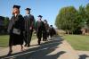 Marketing graduate Shari Smedley and her fellow graduates proceed to the Great Lawn to receive their diplomas at the spring 2007 graduation. - Photo by Kyle Kurlick