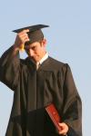 Biology graduate Justin Hutto turns his tassel after receiving his diploma at the spring 2007 graduation ceremony. - Photo by Kyle Kurlick