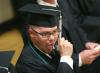 Biblical Studies Languages graduate Jacob Shatzer practices flipping his tassel during the graduate line-up at the 2007 spring graduation. - Photo by Morris Abernathy