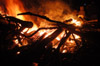 <i>Tornado Bonfire:</i> The SGA sponsored this fiery gathering on the intramural field to celebrate the spirit exhibited on campus during the clean-up. - Photo by Jim Veneman