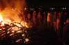 <i>Tornado Bonfire:</i> The Union community gathered on the Tuesday night after the tornado to celebrate their safety and to get rid of some tornado-downed trees. - Photo by Jim Veneman