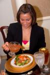 Gina Orosz enjoys a salad during Career Services' Etiquette Luncheon. - Photo by Morris Abernathy