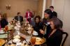 Career Services' Renee Jones demonstrates an eating technique during the Etiquette Luncheon. - Photo by Morris Abernathy