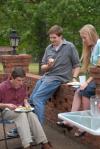 Matt Kuchem, Tyler Whetstone and Racheal Presnell enjoy food at the home of David and Nan Thomas. - Photo by Morris Abernathy