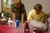 Junior Biology Major Kent Willis and Senior Chemistry Major Nate Eckley mix and serve some nitrogen ice cream to students during lunch in the PAC hallway. They served both chocolate and strawberry. - Photo by Stephanie Schroeder
