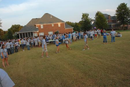 Freshmen enjoy fun and fellowship at President Dockery's house for the annual ice cream social.