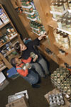 1/20/03 - Lori Smith of Campus Ministries and Micah Traylor organize Area Relief Ministries' pantry during Union's Martin Luther King Jr. service day.