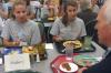 8/27/07 - Mary Alisa Techentin, of Thompson Station, Tenn., and Rachel Pettigrew, of Jackson, Tenn., talks with Stephen Carls, history department chair, during the Dinner with your Department event at New Student Orientation. - Stephanie Schroeder