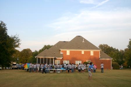 Freshmen enjoy fun and fellowship at President Dockery's house for the annual ice cream social.