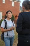 Sarah Kim, a pre-med transfer student from Livingston, N.J., talks with Provost Carla Sanderson at the annual ice cream social held at President Dockery's home. - Photo by Stephanie Schroeder