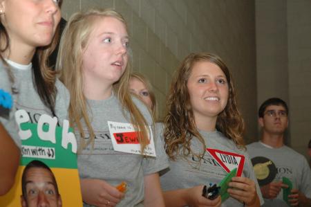 Junior Lydia Marshall watches the video presenting Life Groups to the new students.