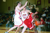 02/46/03 - Junior Mike Simpson (13) and Senior Matt Noah (22) double team a Hannibal La-Grange player.