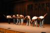 Sophomore Michael Grubb and his assitants give a bow at the end of Grubb's talent portion for Mr. Campus. - Photo by Stephanie Schroeder