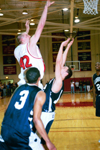 02/44/03 - Freshman Michael Palmer (42) goes up for two against Lambuth.
