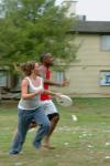 09/11/07 - Freshman Morgan Craddock (front) and Sophomore Darrion Garrett play a game of frisbee on the lawn between Watters and Hurt. 