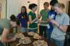 09/10/07 - Calli Hankins offers a variety of treats to McAfee residents as they ventured to different RA rooms during McAfee Progressive Snacking.