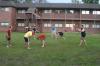 09/10/07 - Some of the residents from McAfee and other recruits play football in McAfee's courtyard shortly after it had rained.