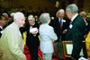 Members of Union's football teams fellowship shortly after being honored at Homecoming 2003. - Photo by Jim Veneman