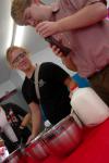 9/27/07 - Danielle Blackstone and Kent Willis make ice cream for a Boys and Girls Club meeting, where students from the physics, chemistry and engineering departments gave presentations. - Neisha Fuson