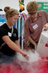9/27/07 - Danielle Blackstone and Kent Willis make ice cream for the children at a Boys and Girls Club. - Neisha Fuson