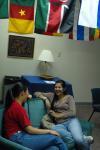 10/1/07 - Senior Jasmine Huang and M.A.I.S. Student Ariane Mansur chat in the international lounge.  - Neisha Fuson