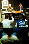 Blake Johnson (right) fields questions from broadcasting majors with assistant professor Steve Beverly at the Communication Arts department's <i>Wisdom from the Trenches</i> during Homecoming 2003. - Photo by Justin Veneman