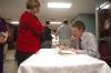 Dr. Edward L. Ayers signed books after speaking at the eleventh annual Carls-Schwerdfeger History Lecture Series.  - Photo by Neisha Fuson