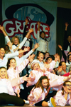 Chi Omega hits their last note during their performance of a number from <i>Grease</i> at All-Sing during Homecoming 2003. - Photo by Lindsay Stavish
