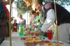 At the Make-A-Wish Foundation party, sponsored by Chi Omega, the men from ATO helped serve drinks to the visitors.  - Photo by Neisha Fuson