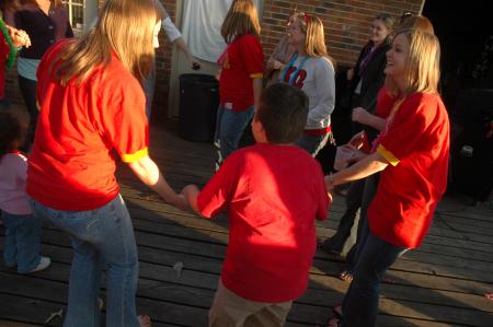 Armando dances with a group of Chi Omegas at a Make-A-Wish Foundation party in his honor. 