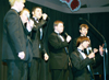 Members of Lambda Chi Alpha perform at All-Sing during Homecoming 2003. - Photo by Lindsay Stavish