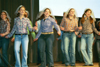 Zeta brides perform Shania Twain's &ldquo;Don't Be Stupid (You Know I Love You)&rdquo; at All-Sing during Homecoming 2003. - Photo by Lindsay Stavish