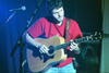 Gabe Scott plays the acoustic guitar with Bebo. - Photo by Lindsay Stavish