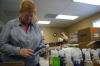 Phyllis Davenport sets out bottles of bath goods to be repackaged into gift bags for mothers at Birth Choice during Day of Remembrance. - Photo by Stephanie Schroeder